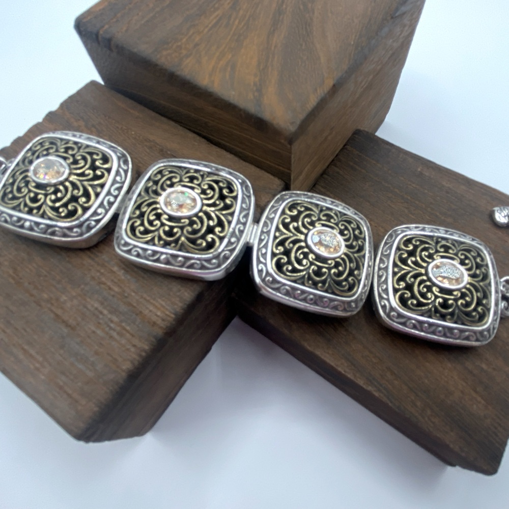 Brighton bracelet, two tone filigree with pale rose gold colored center stones.